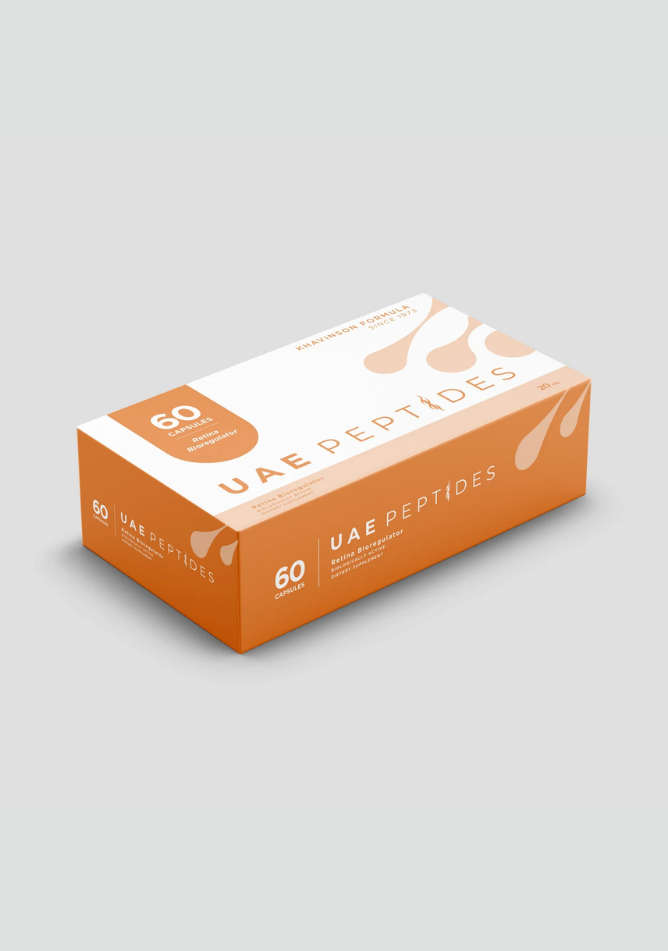 Side image of one box of Dnhealth peptide supplements displayed against a light grey background. The color of the box is white and orange and is labelled as a Retina Bioregulator.