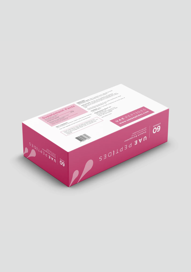 Back side image of one box of Dnhealth peptide supplements displayed against a light grey background. The color of the box is white and pink and is labelled as a Stomack Bioregulator.