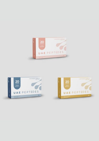 Front image of three boxes of Dnhealth peptide supplements are displayed against a light grey background. The top box is white and pink and is labelled as an Cartilage Bioregulator. The bottom right box is white and dark blue and is labelled as an Prostate Bioregulator. The bottom left box is white and gold and is labelled as an Adrenal Bioregulator.