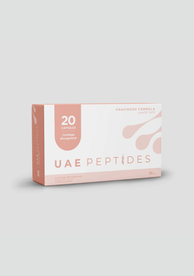 Front image of one box of Dnhealth peptide supplements displayed against a light grey background. The color of the box is white and pink and is labelled as a Cartilage Bioregulator. 