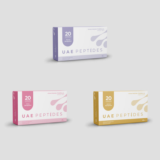 Front image of three boxes of Dnhealth peptide supplements are displayed against a light grey background. The top box is white and lavender and is labelled as a Thyroid Bioregulator. The bottom left box is white and pink and is labelled as an Ovary Bioregulator. The bottom right box is white and gold and is labelled as an Adrenal Bioregulator.